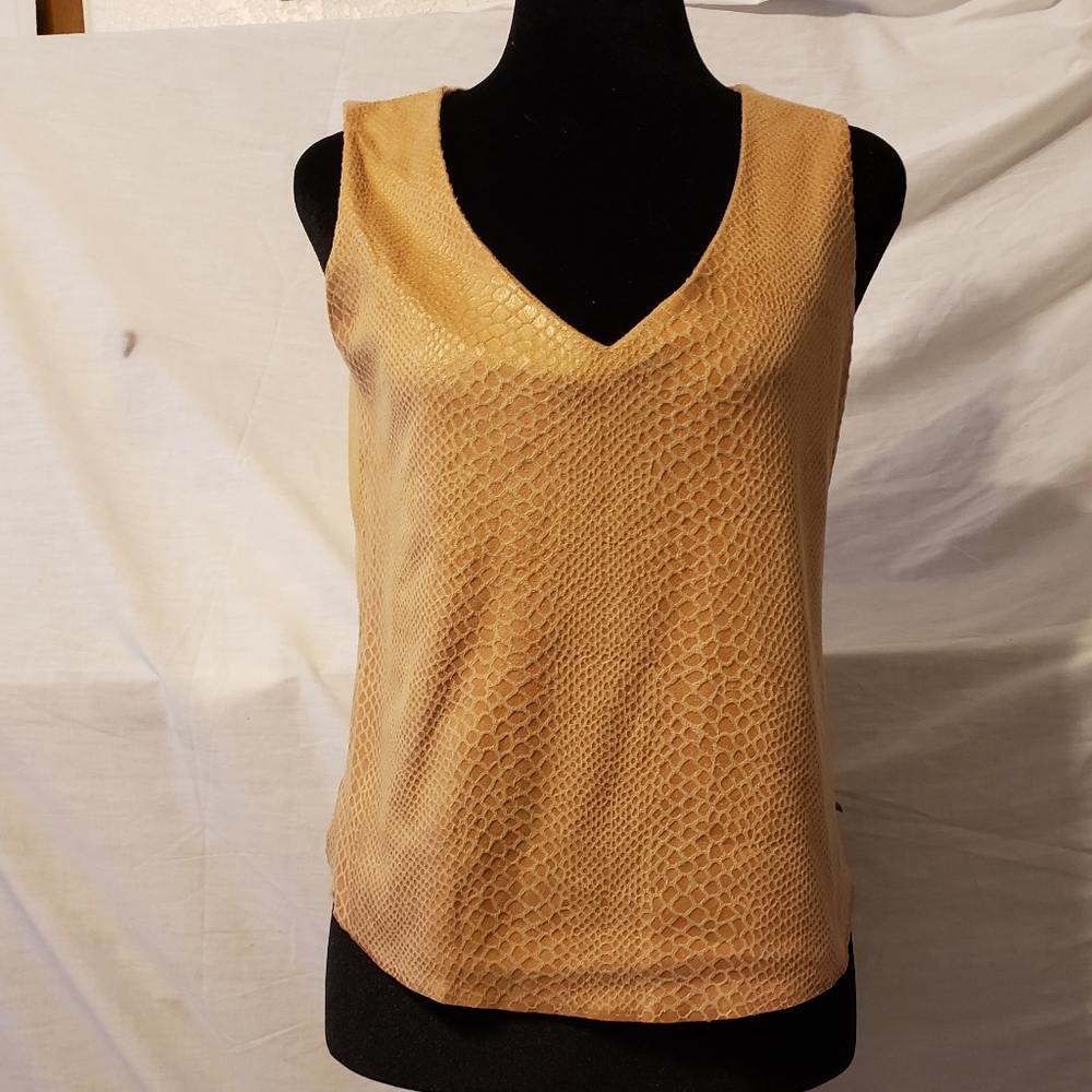 Tan faux suede sleeveless top with snake embossed design on front